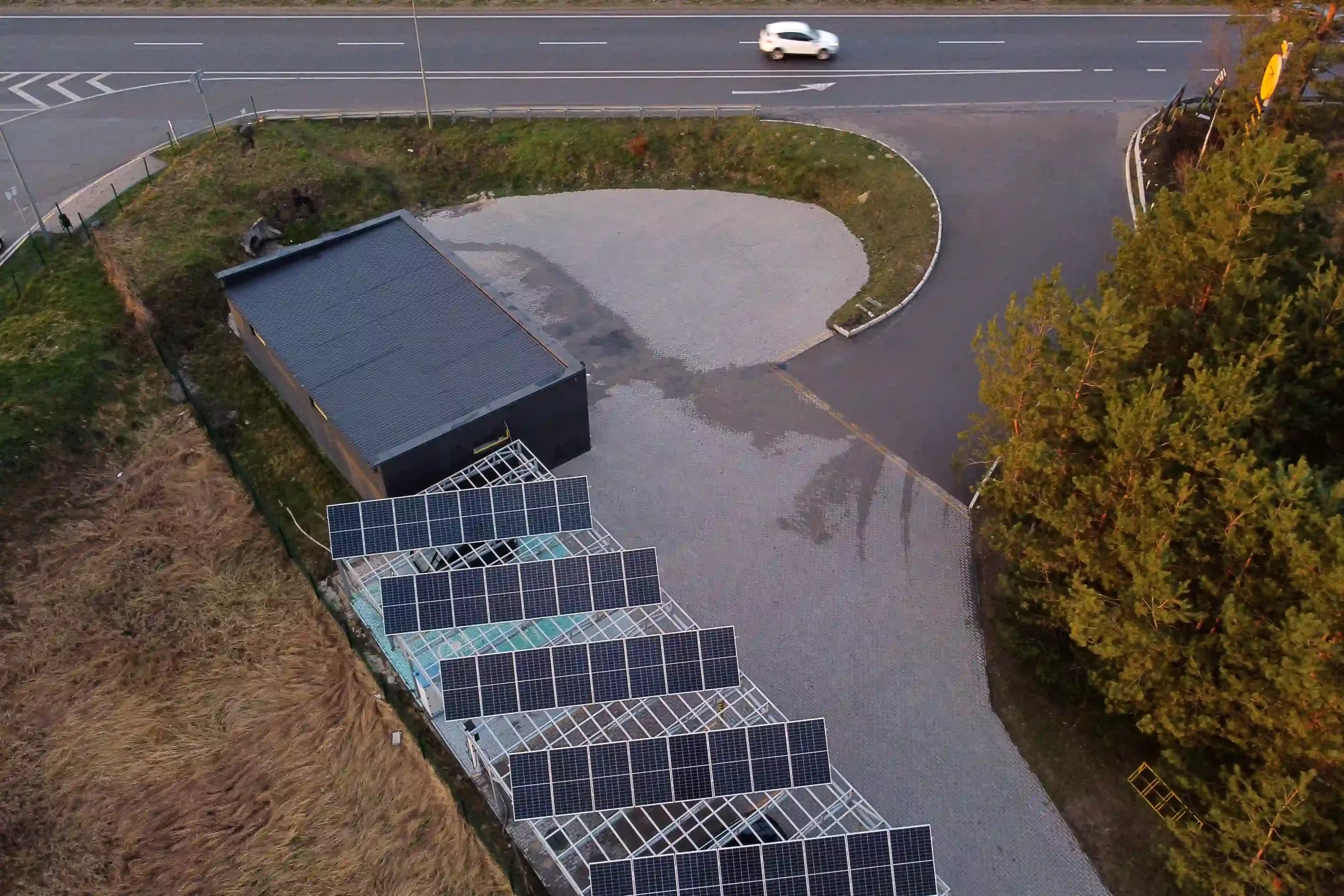 Solar Panel Charging Station For Electric Vehicles Near The Highway