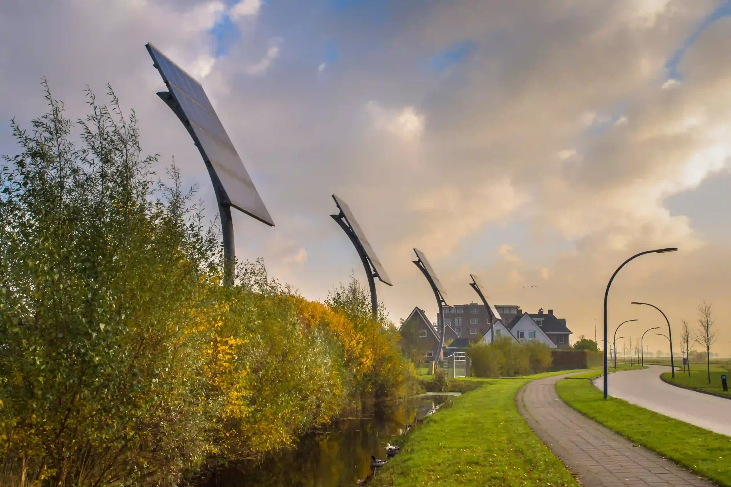 Solar Powered Pathway Lights Illuminating A Garden Path.